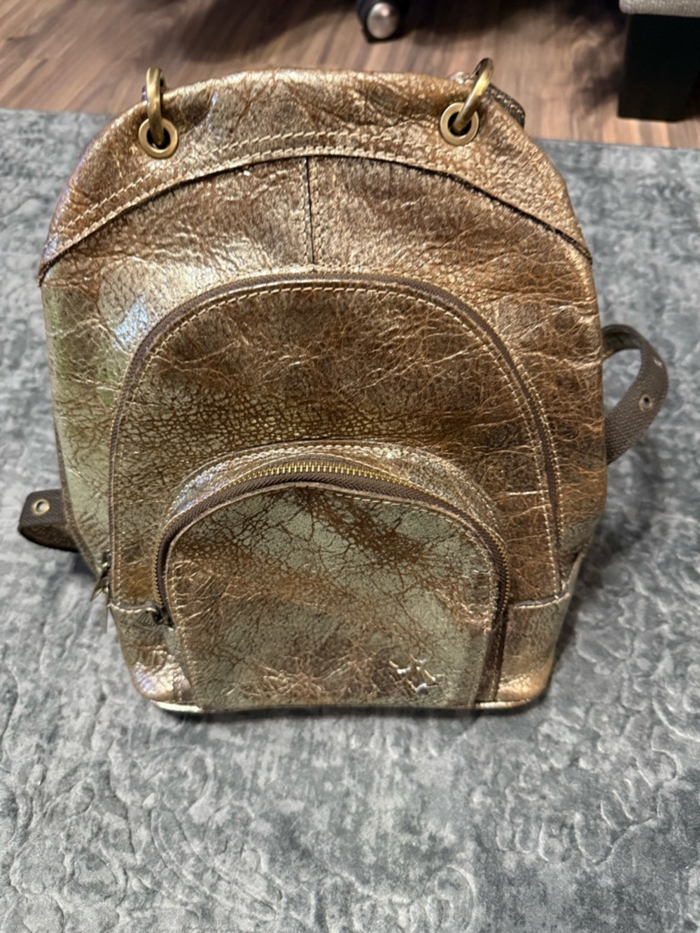 Patricia Nash Alencon backpack in a gold metallic finish. - Picture 2 of 9